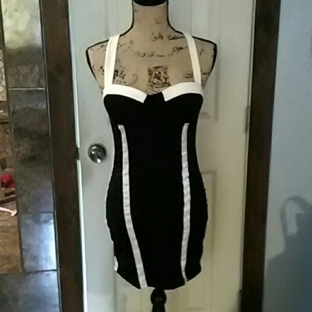 Black and white form fitting dress.